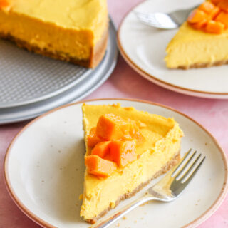 Rich, smooth, creamy baked cheesecake with fresh mango puree!
