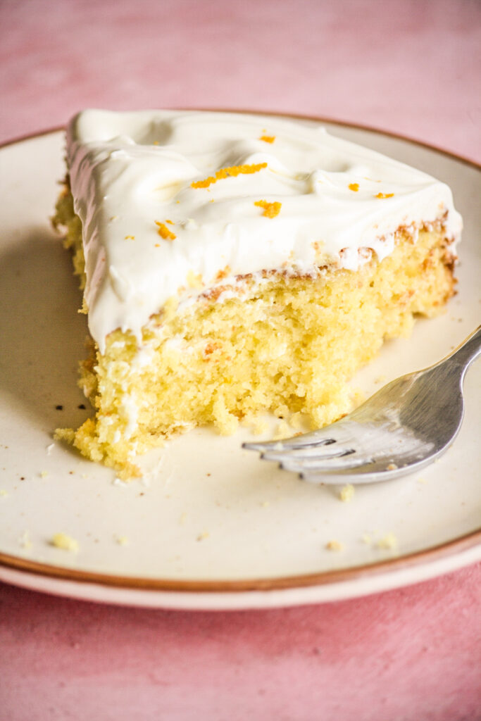 Buttery, citrusy orange cake with a whipped white chocolate and orange ganache frosting