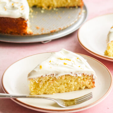 Buttery, citrusy orange cake with a whipped white chocolate and orange ganache frosting