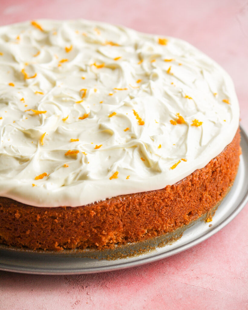 Buttery, citrusy orange cake with a whipped white chocolate and orange ganache frosting