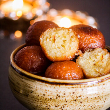 Fried milk powder based dough balls soaked in a saffron and cardamom sugar syrup