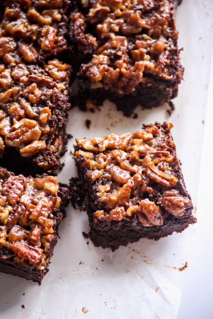 Fudgy dark chocolate brownies with a toasted pecan and caramel layer