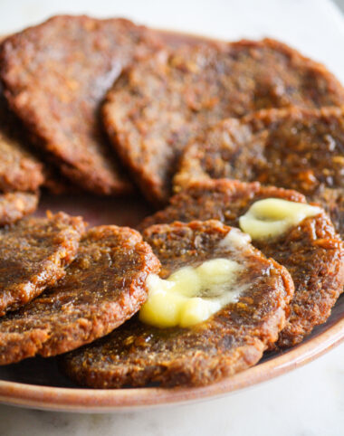Traditional Maharashtrian sweet made from pumpkin and jaggery dough, deep-fried like puris