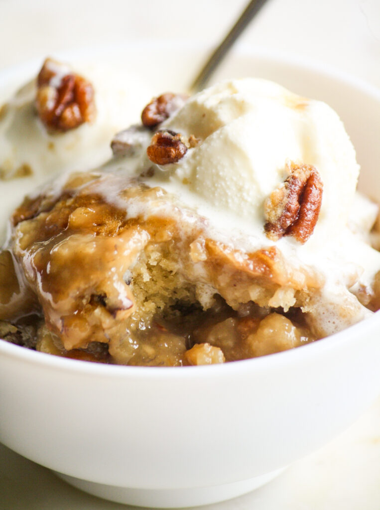 A soft banana pecan cake with a caramel sauce underneath that forms as the pudding bakes