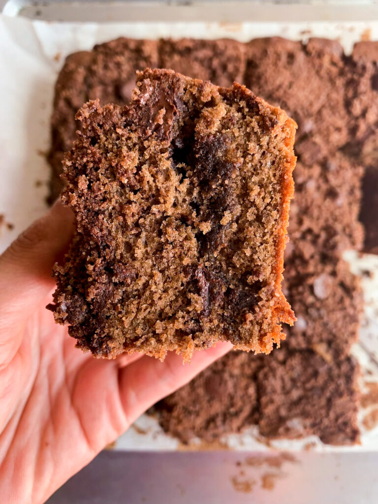 Soft chocolate cake with a cocoa sugar filling, chocolate crumb topping and chocolate chips in every layer!