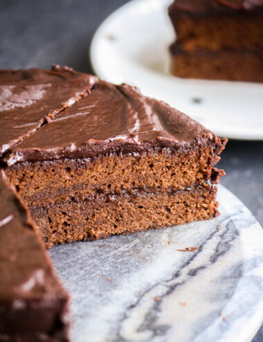 Soft chocolate sponge filled and covered with apricot jam plus a crackly chocolate glaze