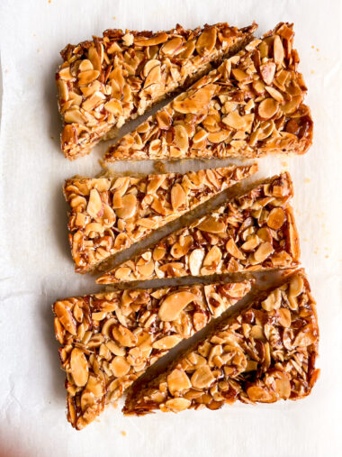 Crisp buttery shortbread crust with a topping of crunchy almonds coated in honey caramel