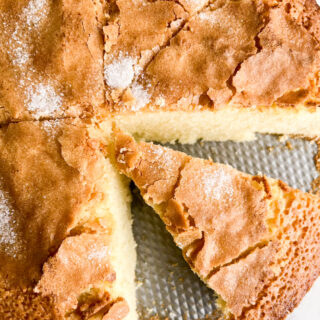 A soft, plush cake flavoured with lemon and vanilla, with a crackly sugar crust
