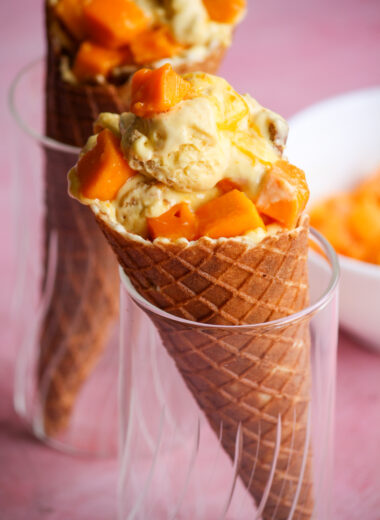 Easy, delicious, mango icecream with cream cheese and biscuit pieces!