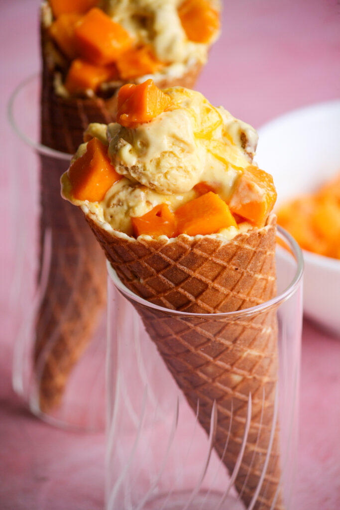 Easy, delicious, mango ice cream with cream cheese and biscuit pieces!