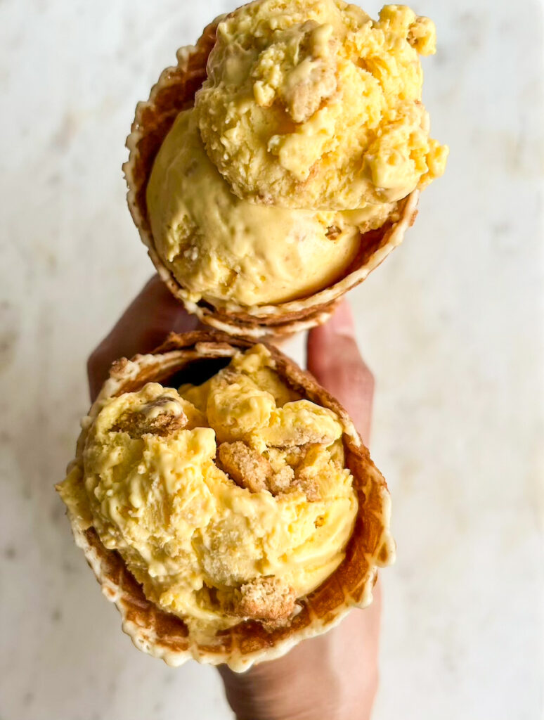 Easy, delicious, mango ice cream with cream cheese and biscuit pieces!