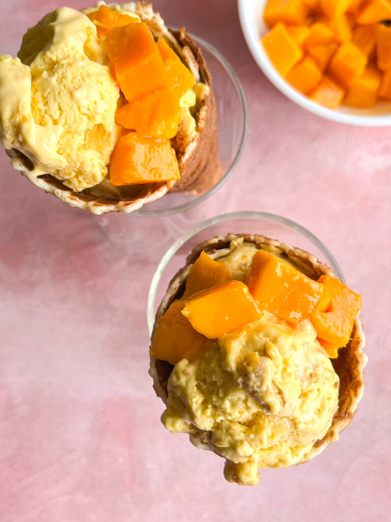 Easy, delicious, mango ice cream with cream cheese and biscuit pieces!