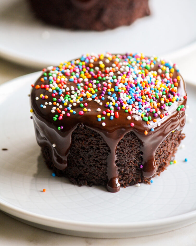 Two individual chocolate cakes with a simple ganache and no eggs