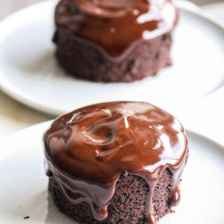 Two individual chocolate cakes with a simple ganache and no eggs