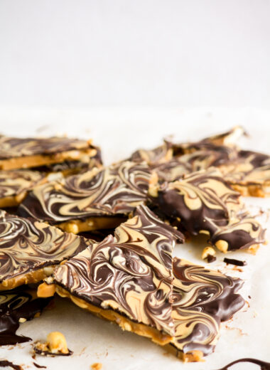 Crunchy toffee base with salted peanuts, dark chocolate topping and peanut butter swirled on to