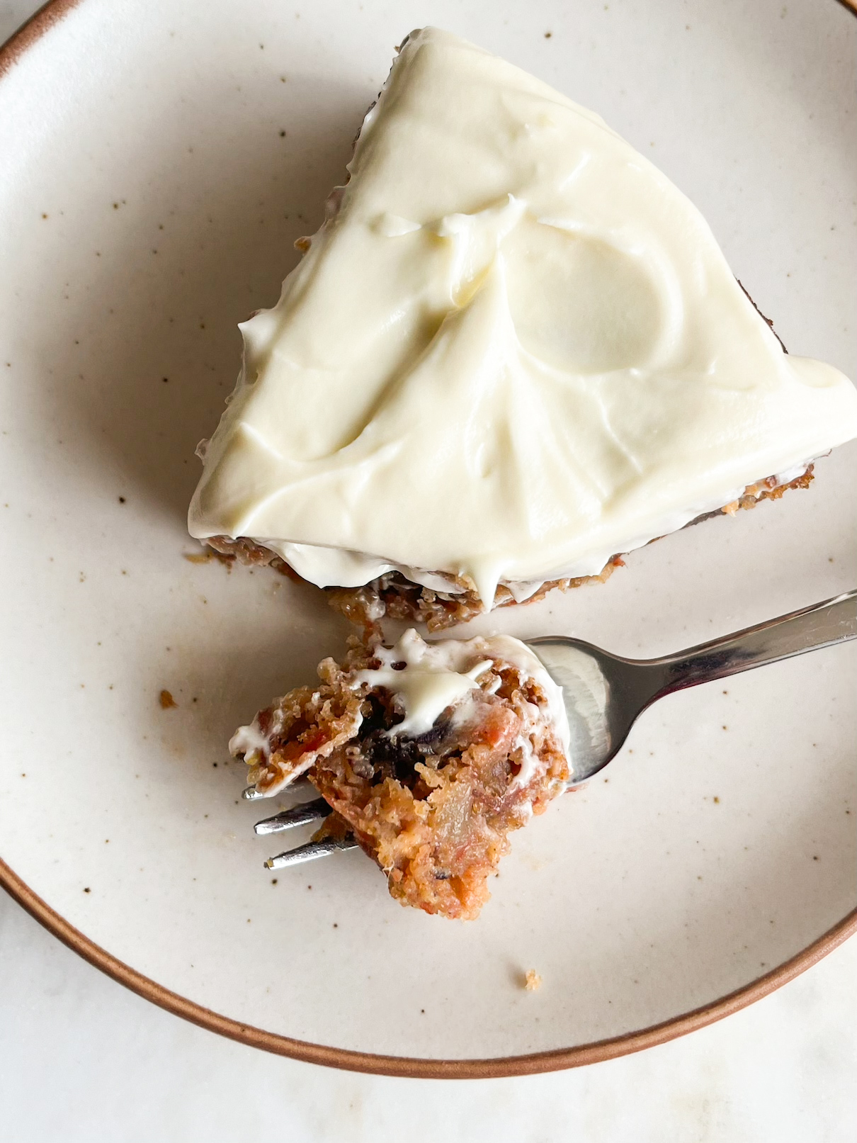 Moist carrot cake with chopped dates and an easy cream cheese frosting