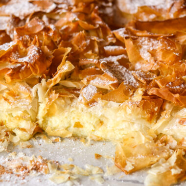 Flaky Greek filo pie with a vanilla and orange flavoured custard filling