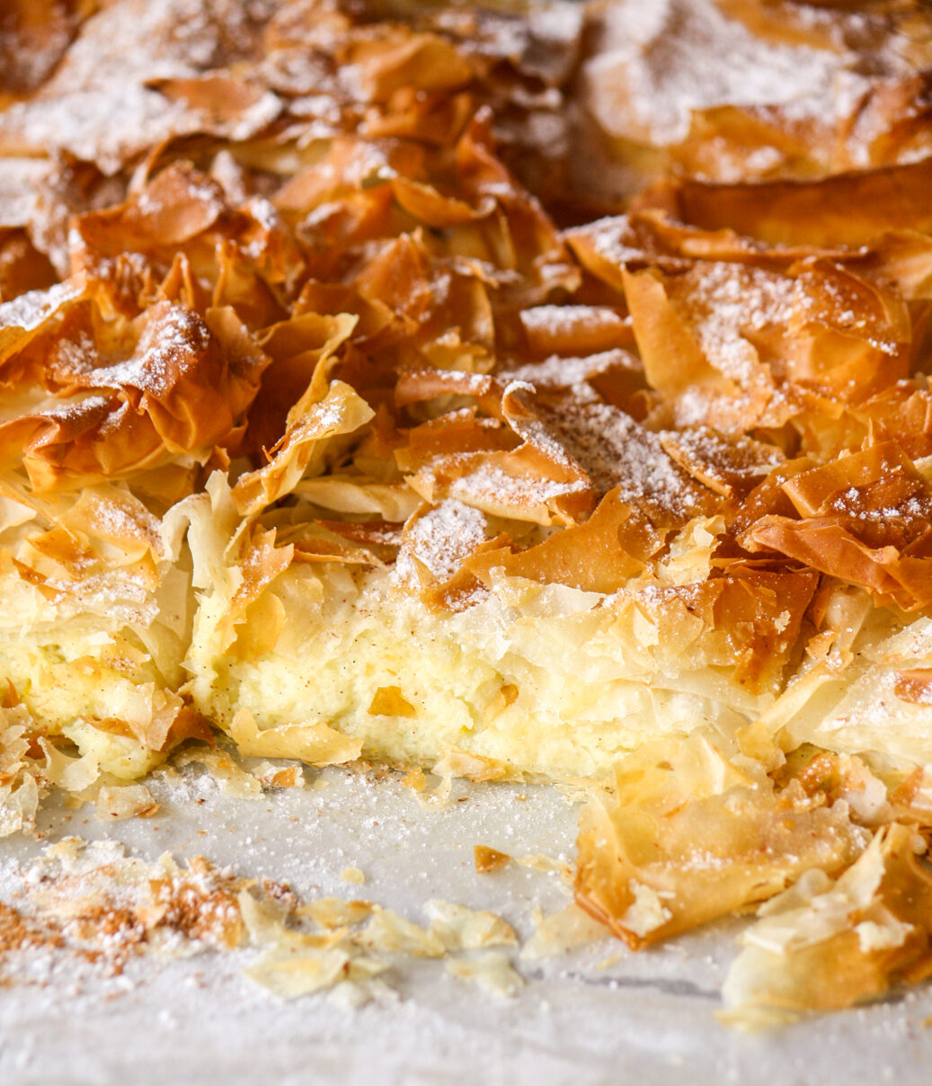 Flaky Greek filo pie with a vanilla and orange flavoured custard filling