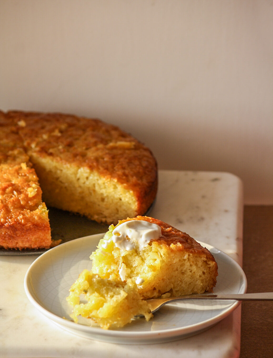 A very moist, syrup-soaked orange cake made with dried and crushed filo pastry
